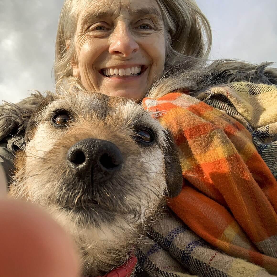 Smart Dog Accelerator Program customer taking selfie with her dog